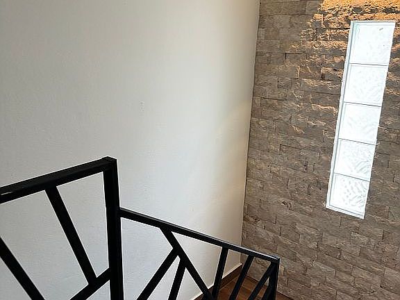 Balanced iron-stone-wood