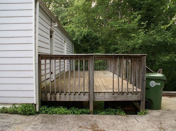 deck with nice size backyard
