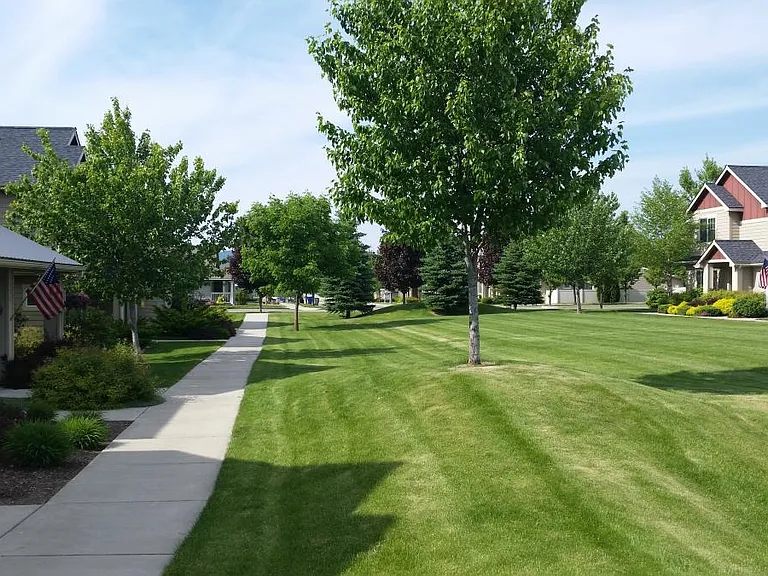 Home is positioned on a quiet park with a path leading right to the Centennial Trail