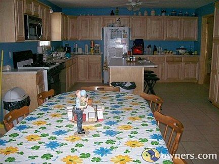 Open kitchen/dining room, Lots of cabinet space. Built in pantry