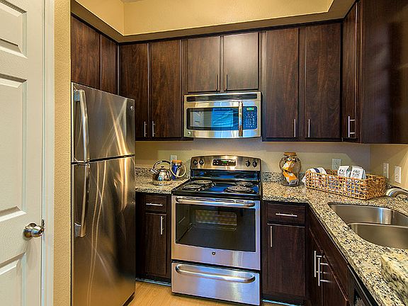 Espresso Cabinets and Granite Countertops