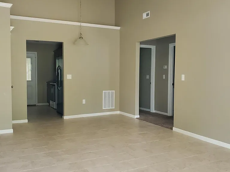 Tile floors in living room, kitchen and bathrooms helps keep it low maintenance.
