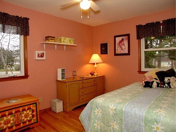 All 3 bedrooms have hardwood floors & ceiling fans!