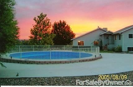 Front entrance
						:
						Small swimming pool, circle driveway, front yard. Entire home fully landscaped.