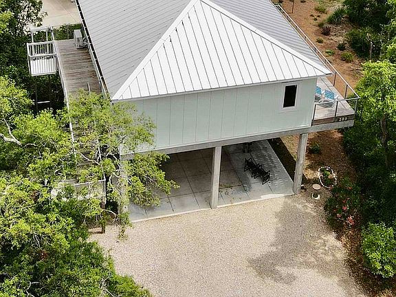 West side and driveway.