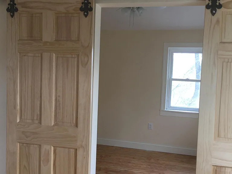 638 Church Road - sliding double doors separate bedrooms