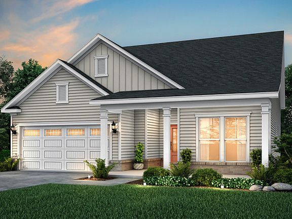 Bedrock Exterior LC3G features siding, brick accents and covered front porch