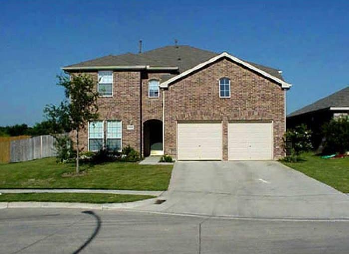 House exterior with decorative brick's accents