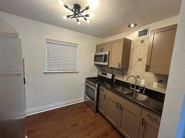 5612 Grover Ave #101 — Photo 12