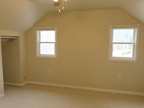 Bedrooms w/ Berber carpeting