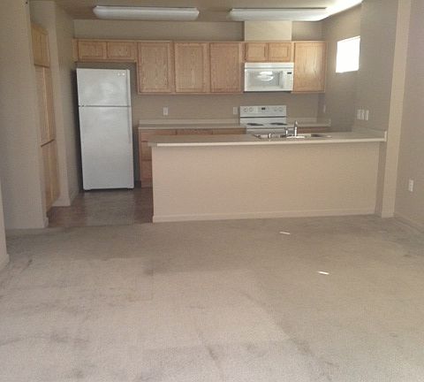 Spacious living room and bright kitchen