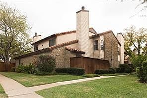 Exterior of 5626 Preston Oaks 5A, in a gated community