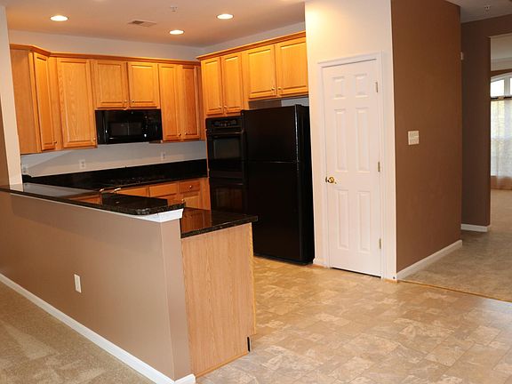 Kitchen with breakfast bar.