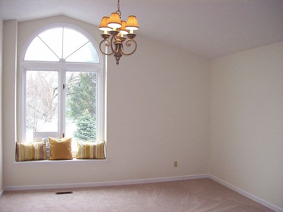 Master bedroom with walk-in closet and private bath.