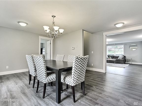 Dining Room. Additional Bedroom/office on Main floor and 1 of 2 stairwells 