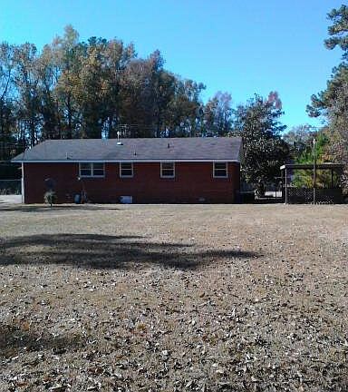 Massive Back Yard with tall fence