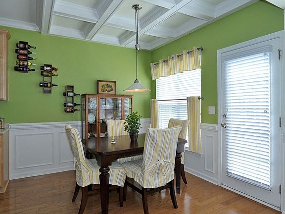 Details such as a coffered ceiling are found throughout.