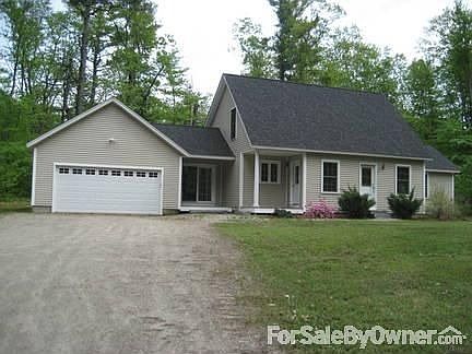 Front View of Home
						:
						2 Car Garage, Sliding Doors & Side Door to Eat-in Kitchen and Main Front Door.