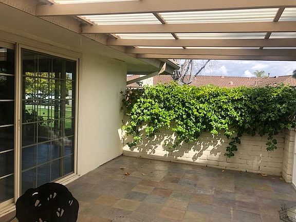 Patio with gate to pool