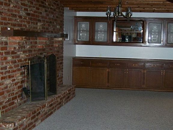 Formal Dining with Fireplace and Built-ins