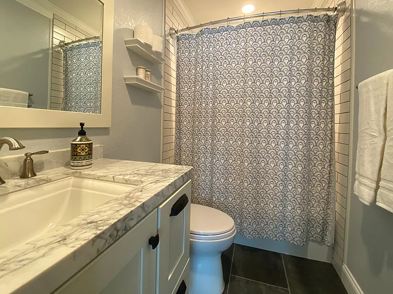 Fresh and functional guest bathroom designed for comfort and convenience.