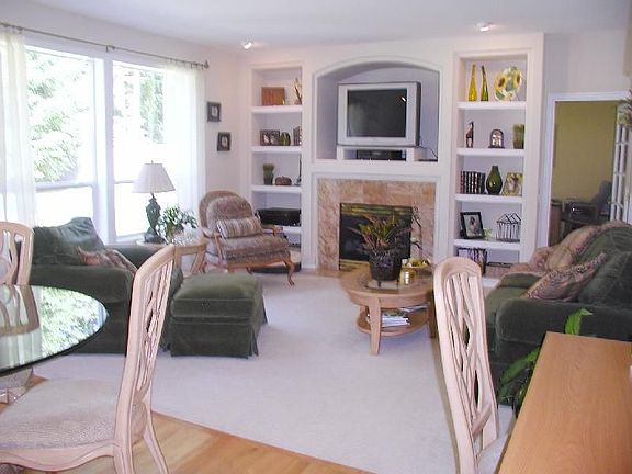 Family Room with Built-in Shelves and Fireplace