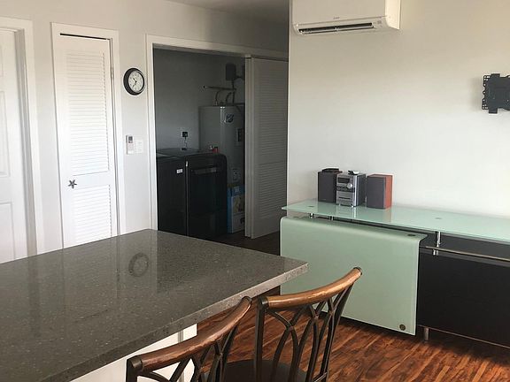 View from living area to laundry and hall