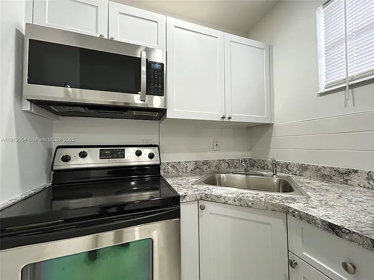 6950 NW 8th Ave #3 — Photo 2
