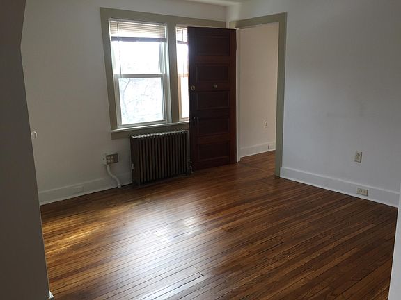 Living room, warm wood floors throughout