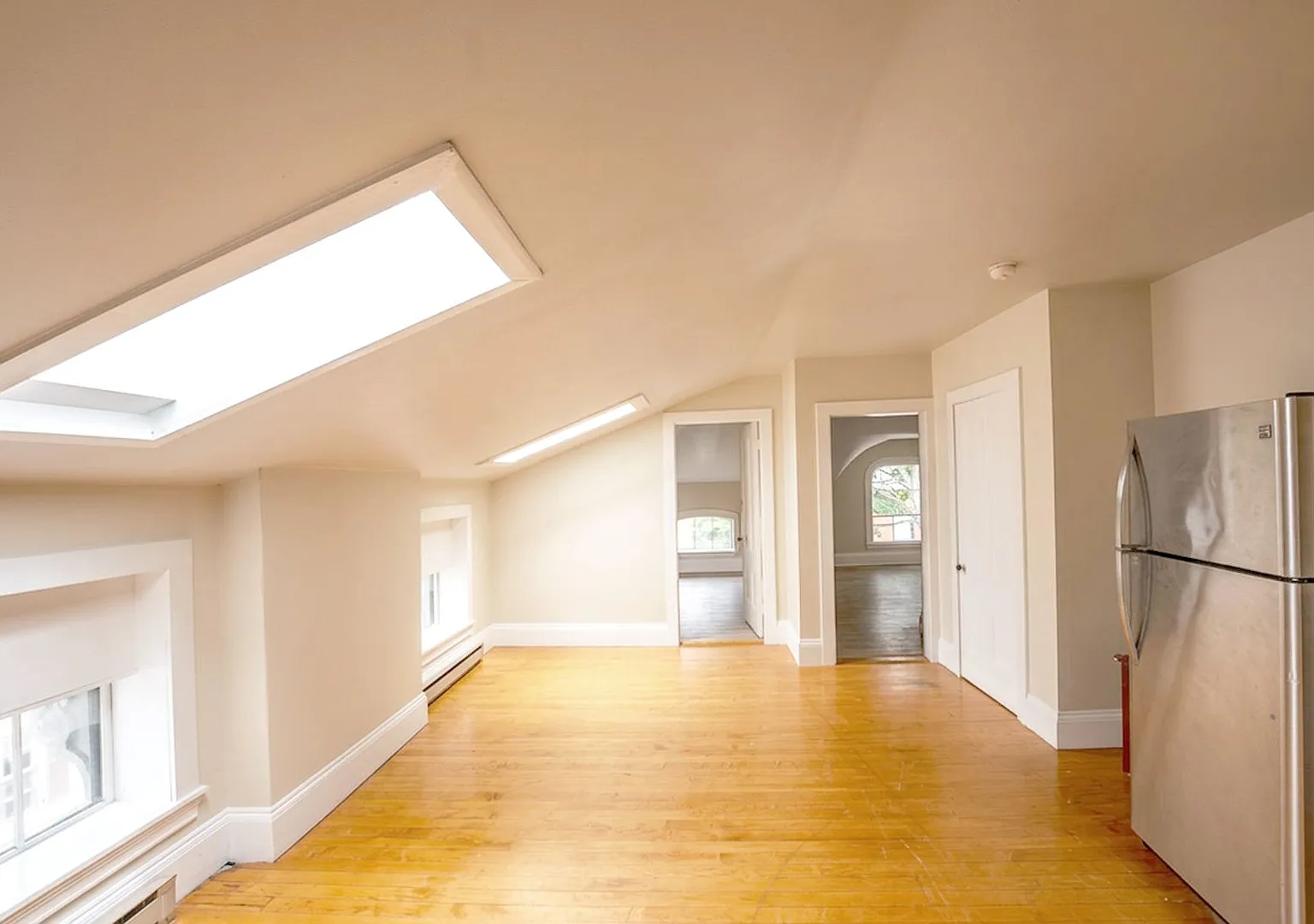 Top-Floor 2-Bedroom Oasis | Heat, Hot Water, Parking & Laundry in the West End! — Photo 4