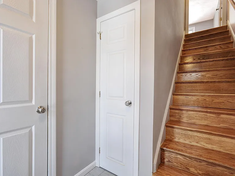 Entry way from garage and stairs up to living space