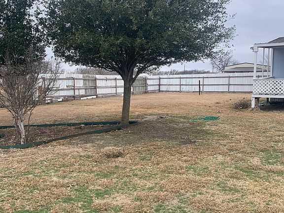 huge fenced back yard