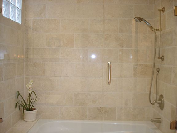 Remodeled stone tile bathroom