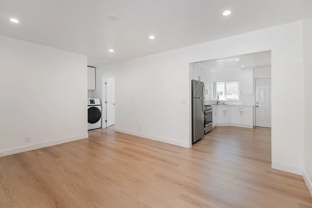Living Room with Recessed Lighting Leading into the kitchen - 268 E Providencia Ave #B
