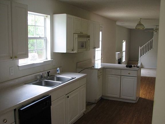 Spacious kitchen overlooking family room