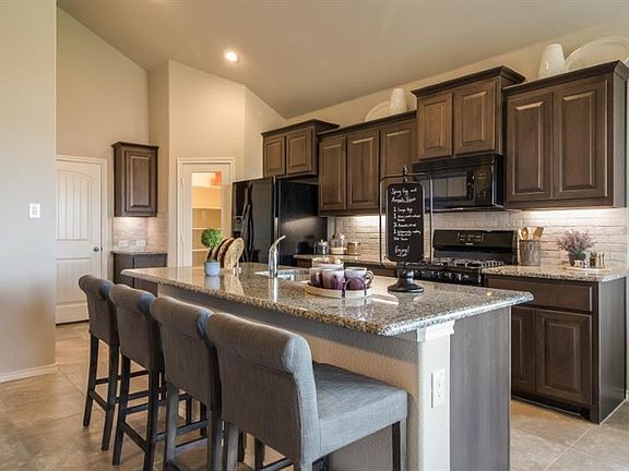 Photos shown here may not depict the specified home & features included are for illustration purposes only
