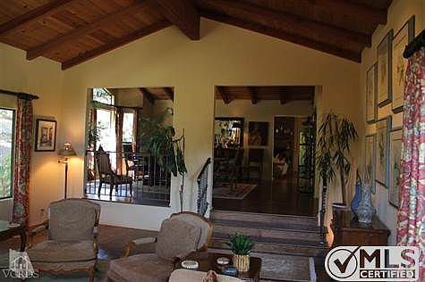 View from living room to formal dining room shows how beautifully this floor plan functions for ente