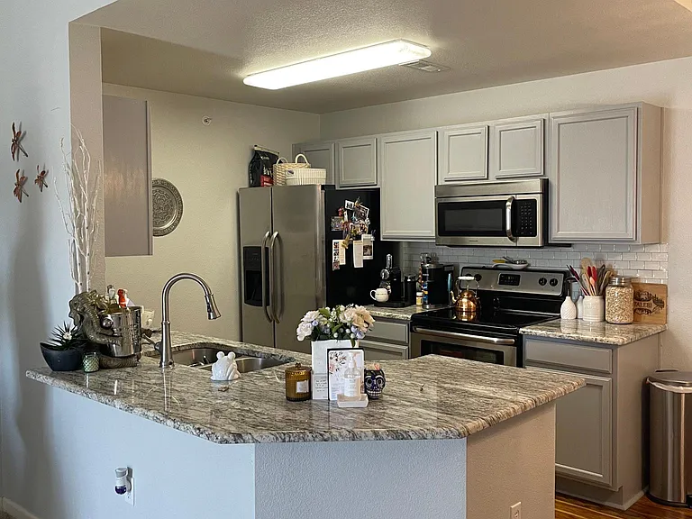 7440 S Blackhawk St #16303 — Photo 2