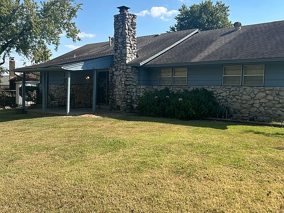 View of the back of the house and covered patio
