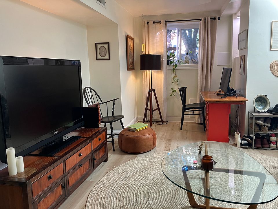 Living room and reading nook/desk area.