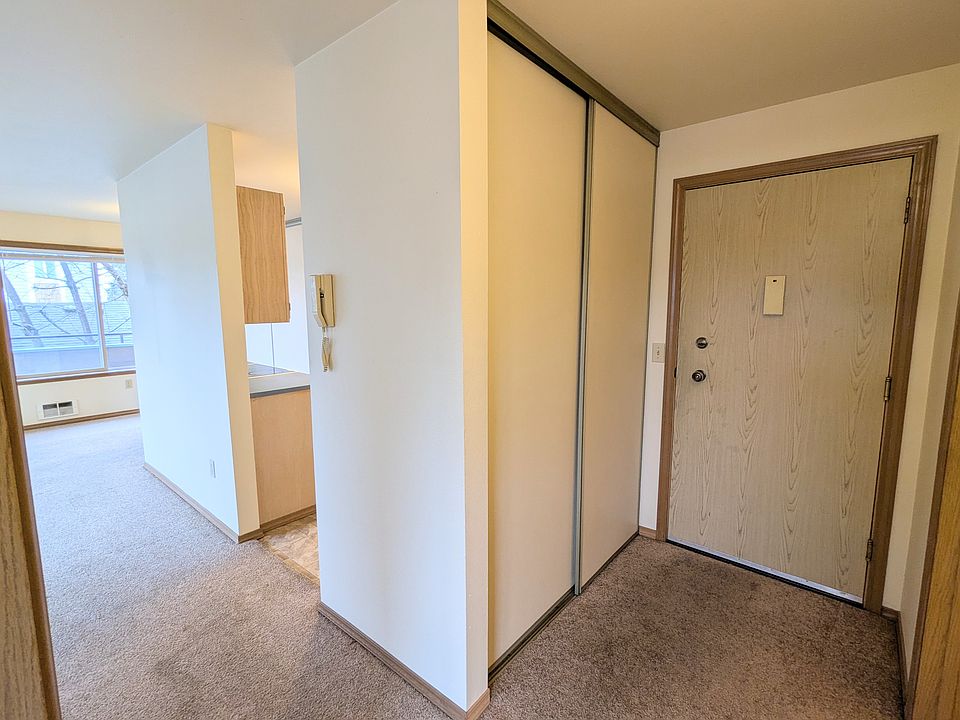 Entry closet and view into the apartment