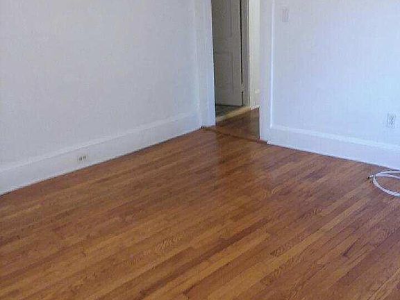 Living room 360 degree view looking to Hallway Bathroom door on left