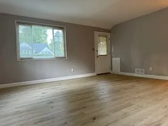 Entrance into living room - new floor and paint.