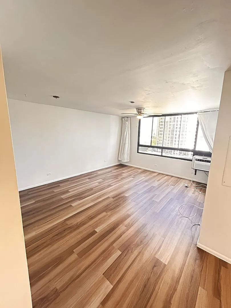 Window AC, City Views, Natural Light — Photo 1