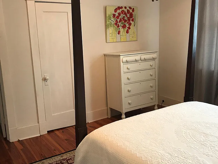 Bedroom 1- view of dresser and closet