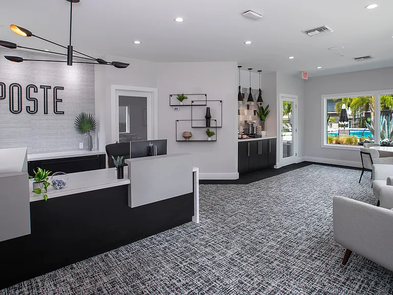 Step into the bright and inviting leasing office at Poste Winter Park Apartments. ith a sleek design, refreshment station, and large windows overlooking the pool, this space invites you to feel at home from the moment you enter.