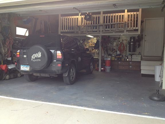 Garage showing loft storage