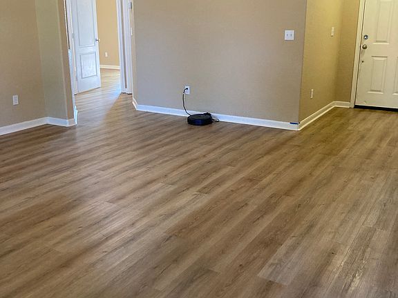Open living area with setback for television and decorative cubby