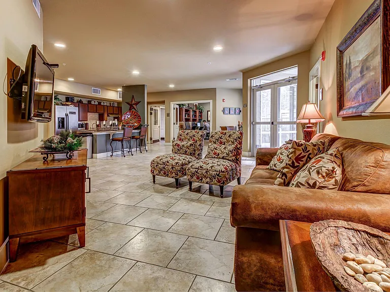 Clubroom with couches and satellite TV