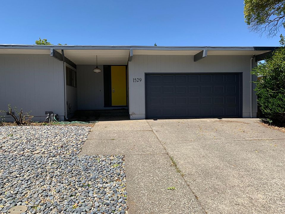 Front of house, off street parking and garage